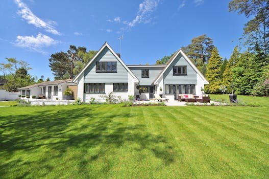 pexels-photo-280222-280222 White and Gray Wooden House Near Grass Field and Trees